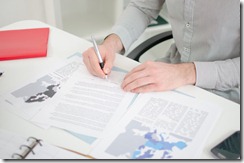 Businessman analyzing economic documents